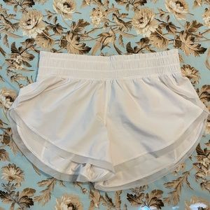 Lululemon white shorts with mesh hemming, size 6 unlined
